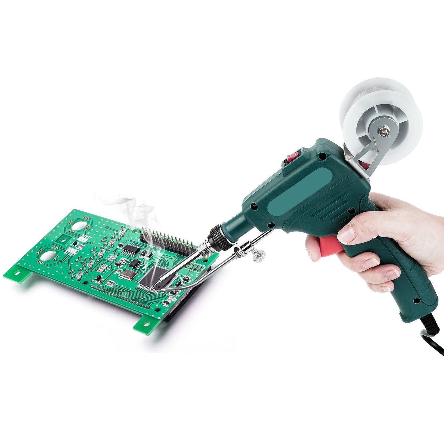 Soldering gun in use, desoldering a circuit board with smoke rising, showcasing electronic repair tools for hobbyists and professionals.