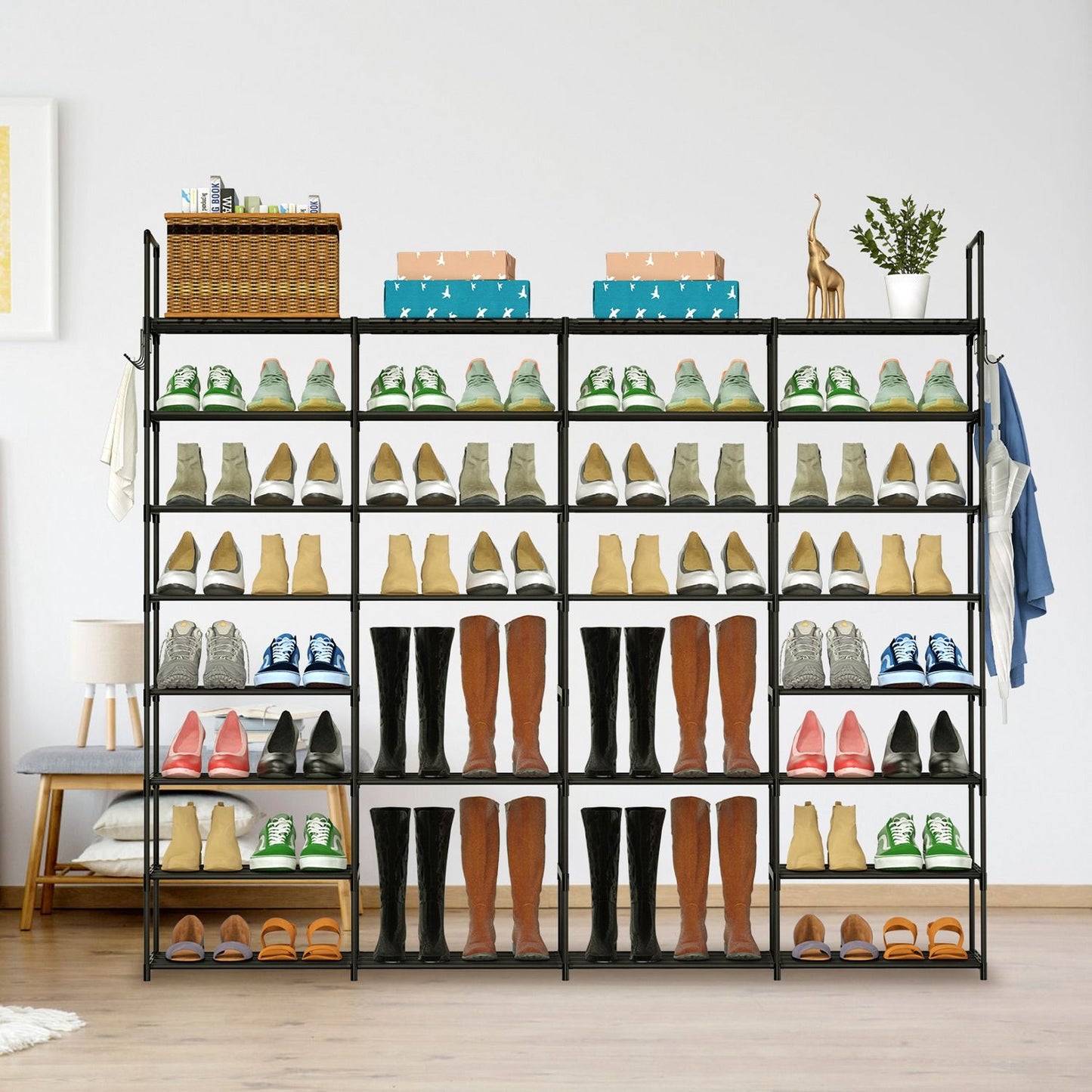 Shoe rack displaying a variety of footwear including sneakers, boots, heels, and sandals, with decorative storage boxes and a small plant on top, set in a modern living space.