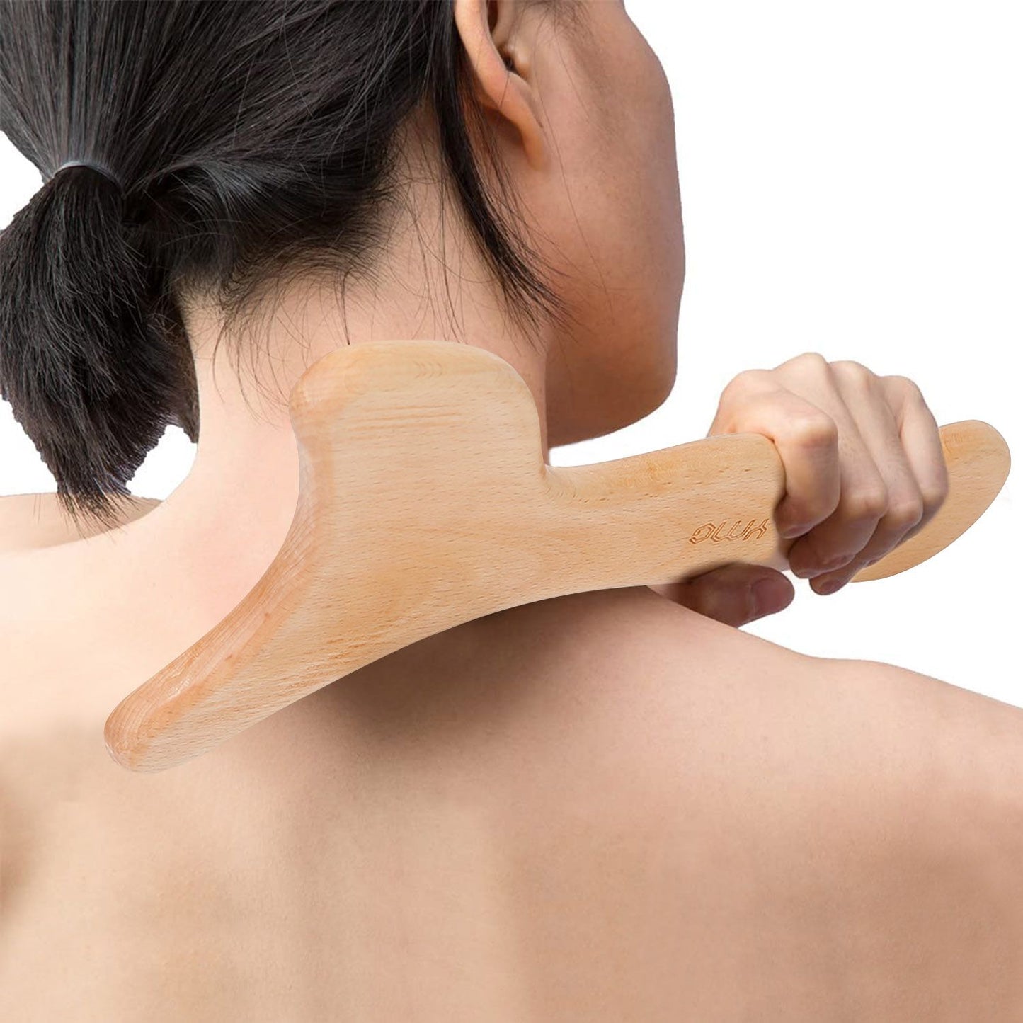 Woman using a wooden Gua Sha tool on her neck for massage and relaxation, showcasing the ergonomic design and natural material.