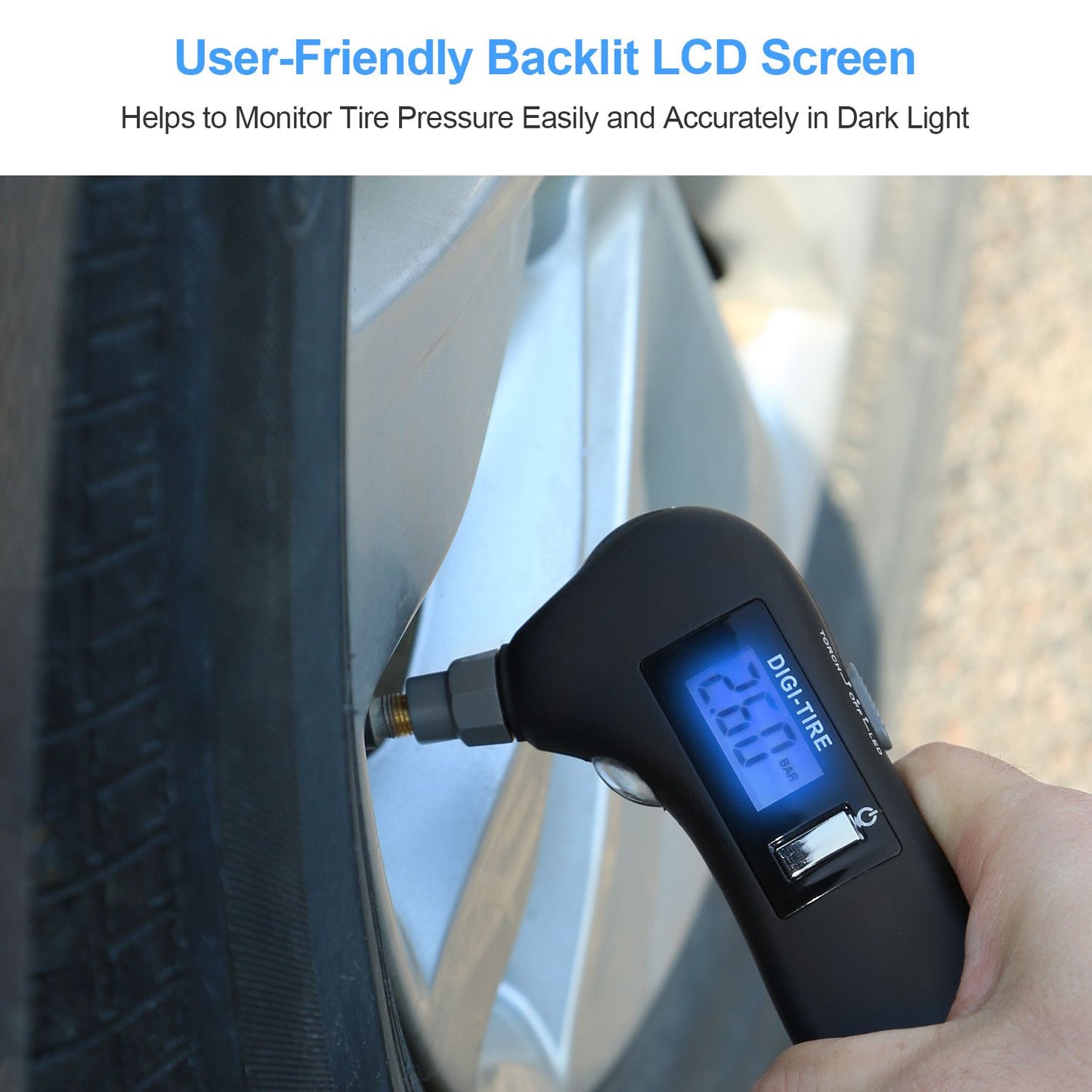 Backlit LCD tire pressure gauge displaying 26.0 PSI while being used on a car tire, designed for easy and accurate measurement in low light conditions.