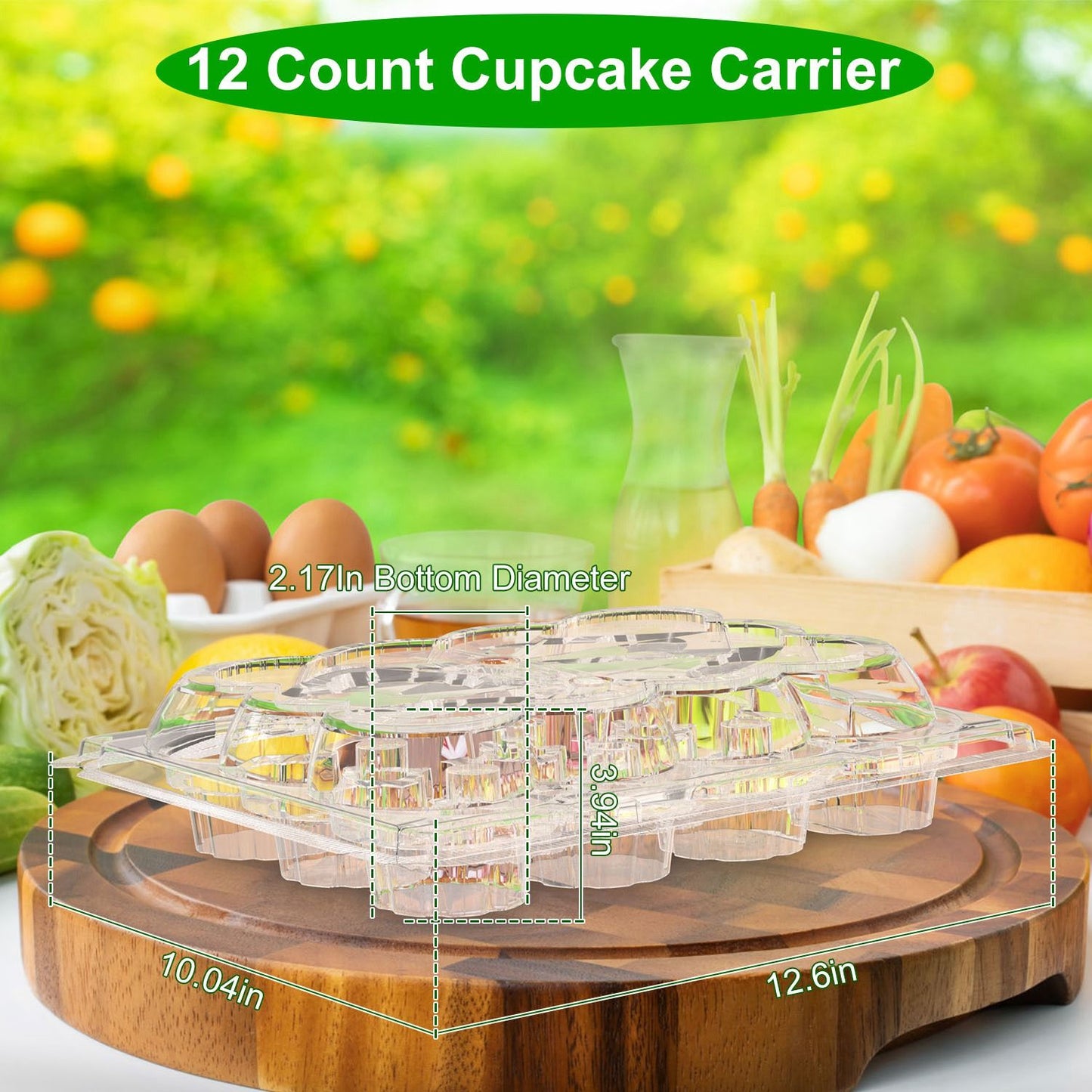 Clear plastic cupcake carrier featuring capacities for 12 cupcakes, measuring 12.6 inches by 10.04 inches, with a bottom diameter of 2.17 inches, set against a vibrant kitchen background filled with fresh vegetables and fruits.