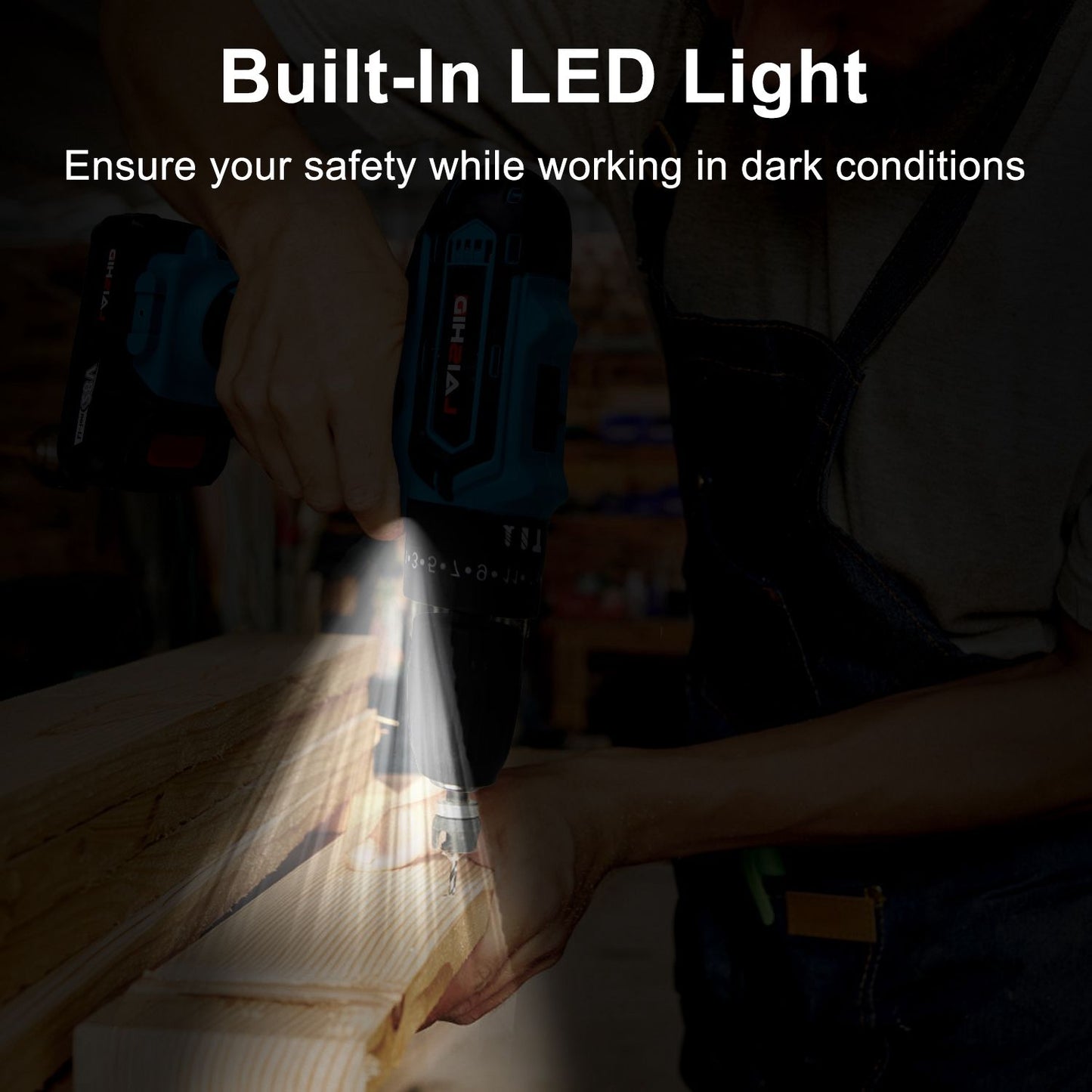 Person using a power drill with built-in LED light to safely work on wood in dim lighting conditions.