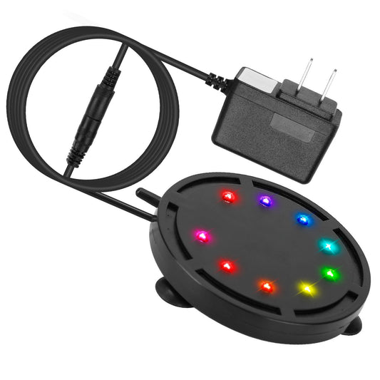 Colorful LED charging pad with eight illuminated lights in red, blue, green, yellow, and pink, accompanied by a power adapter and connecting cable, ideal for wireless charging.