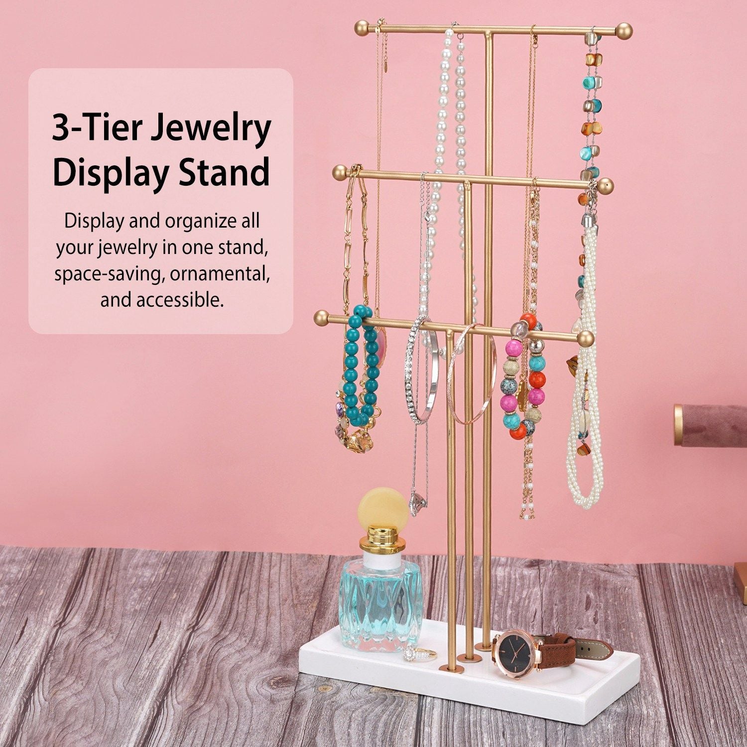 3-tier gold jewelry display stand showcasing colorful necklaces and bracelets, designed for efficient organization and easy access; perfect for adding a decorative touch to any space.