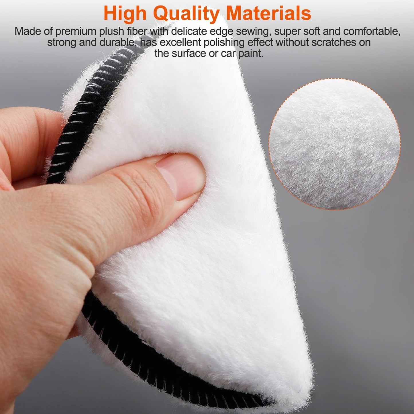 Close-up of a hand holding a soft, premium plush microfiber polishing pad with black edges, ideal for cleaning and polishing without scratching surfaces or car paint.