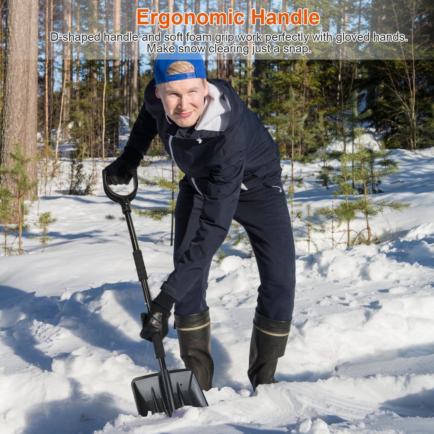 Person using a snow shovel with an ergonomic D-shaped handle and soft foam grip in a snowy landscape, showcasing comfort during snow clearing tasks.
