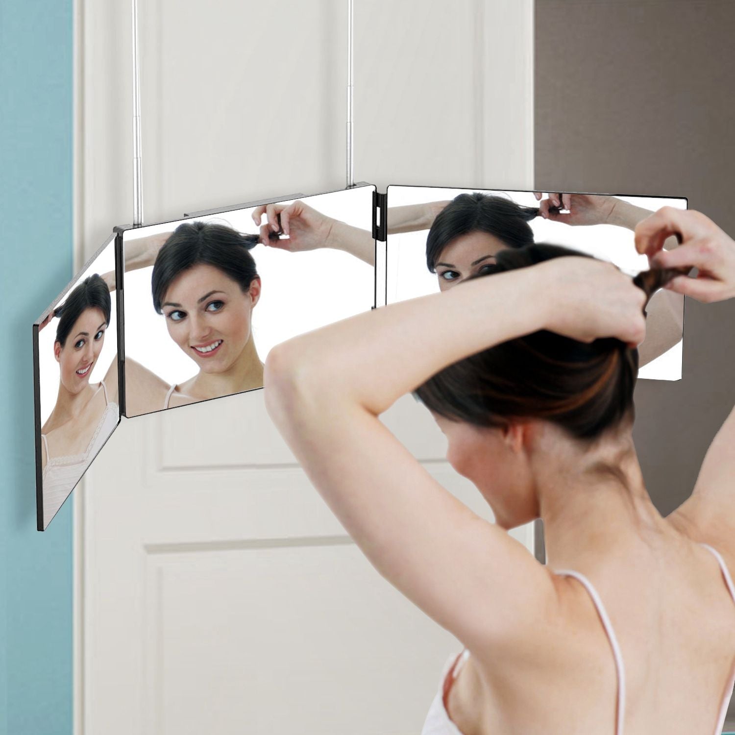 Adjustable three-panel wall mirror for convenience in hairstyling and grooming.