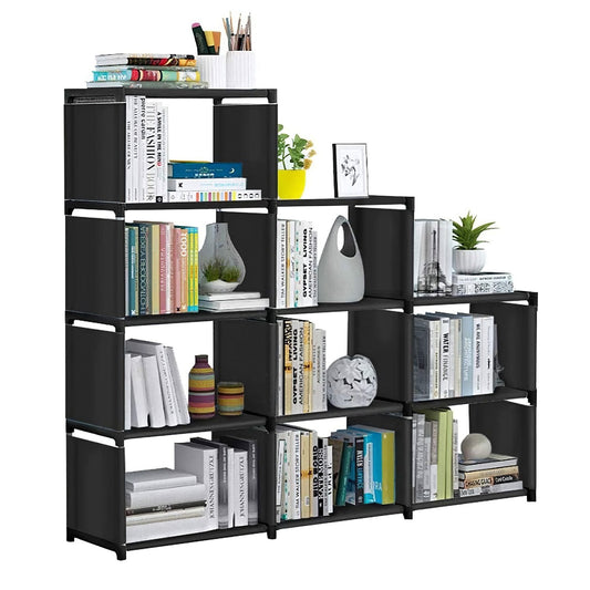 Modern black bookshelf with multiple compartments, filled with colorful books, decorative vases, and plants, perfect for stylish home organization.