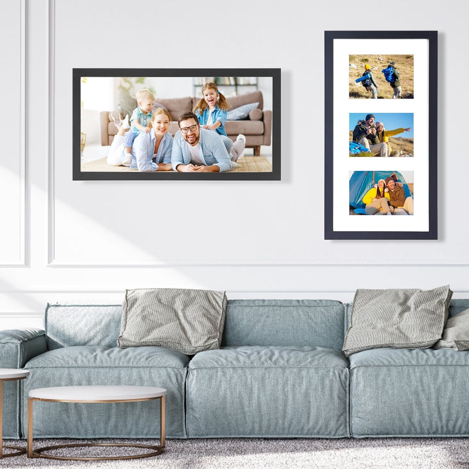 Modern living room decor featuring framed family photos on the wall, a comfortable light blue sofa, and a round coffee table.