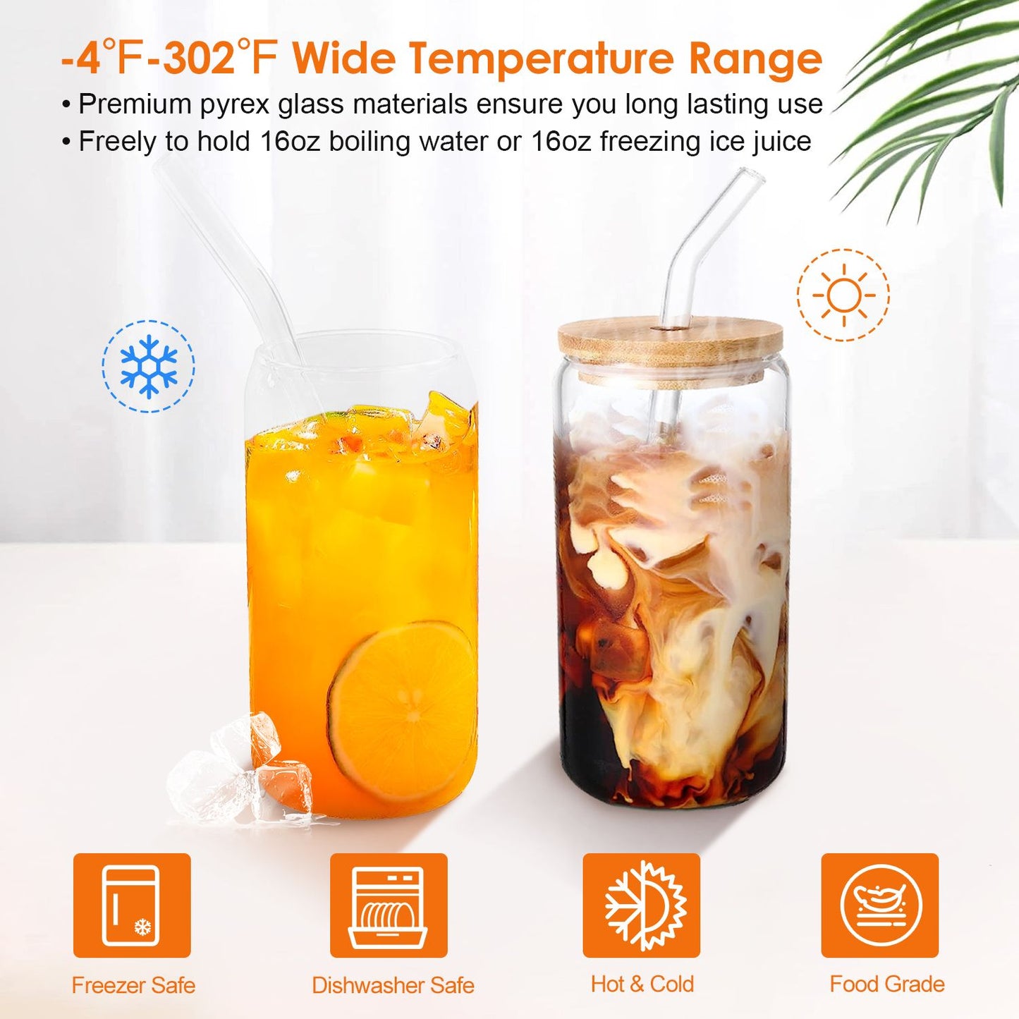 Image of two 16 oz pyrex glass tumblers showcasing wide temperature range from -4°F to 302°F, one filled with iced orange drink and lemon, the other with mixed coffee, featuring a bamboo lid and straw, highlighting freezer safe, dishwasher safe, and food-grade properties.
