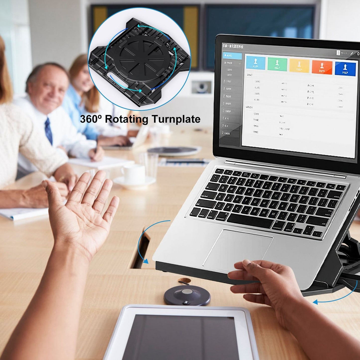 Laptop on a 360° rotating turnplate in a modern conference room, showcasing ease of use and collaboration during a meeting.