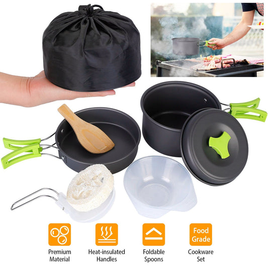 Compact cookware set featuring a portable black storage bag, aluminum pots with heat-insulated green handles, a wooden spoon, and foldable spoons, perfect for camping and outdoor cooking.