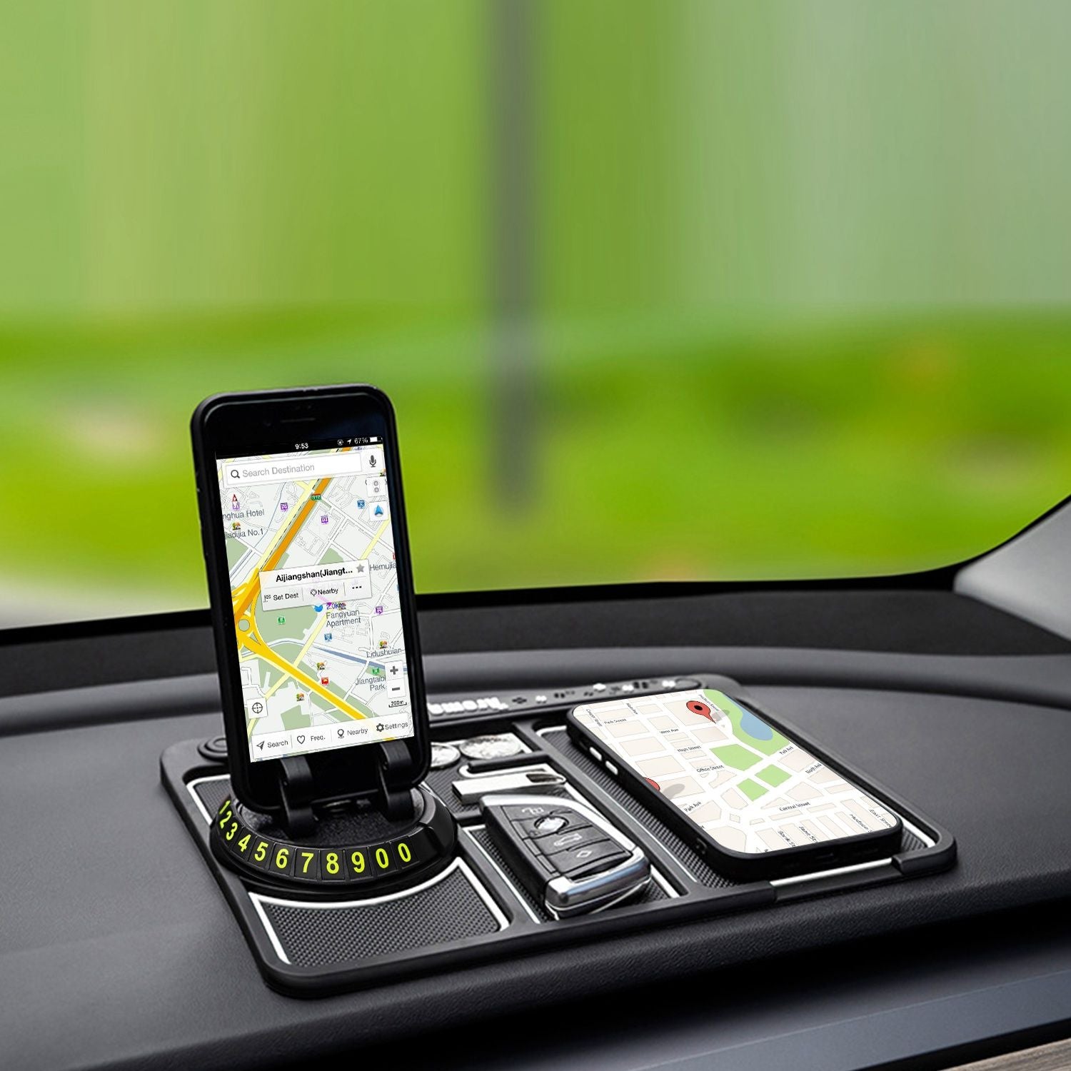Car dashboard mount with smartphone displaying a navigation map, featuring a smartphone dock and a car key, illustrating convenience for hands-free driving and location tracking.