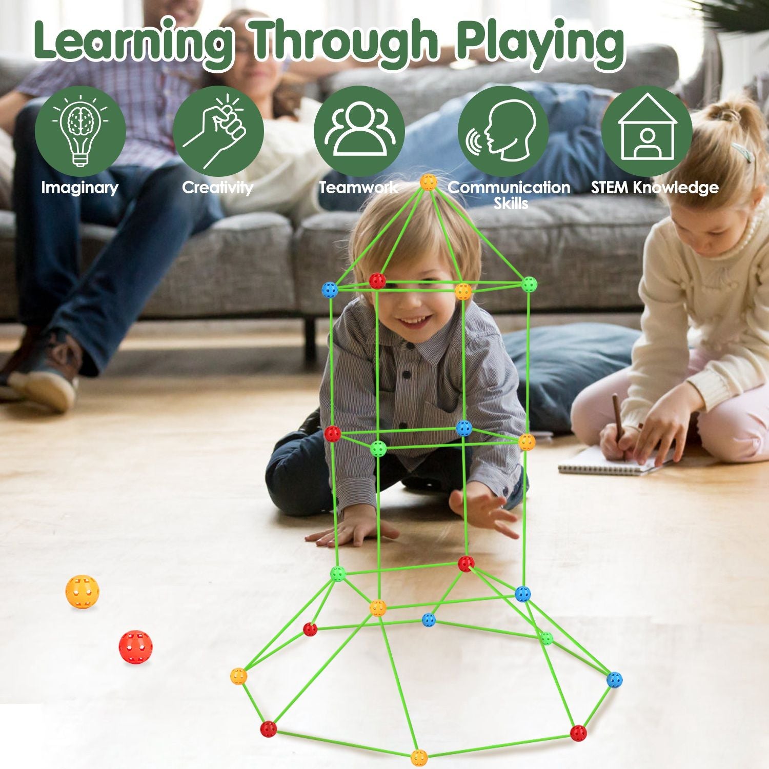 Children engaging in STEM play with colorful building sticks and balls, fostering teamwork, creativity, and communication skills in a family-friendly environment.