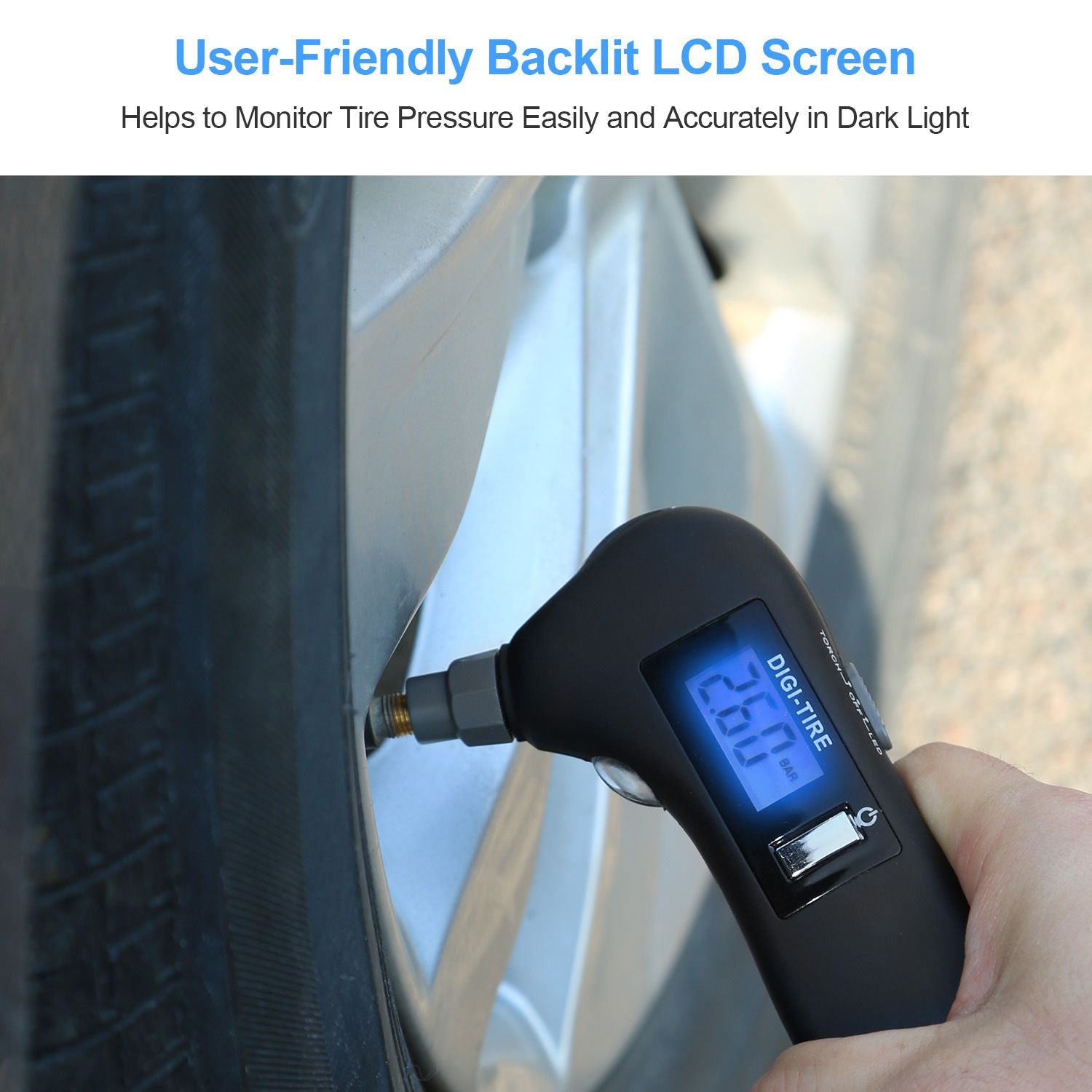 Backlit LCD tire pressure gauge displaying 26.0 PSI while being used on a car tire, designed for easy and accurate measurement in low light conditions.