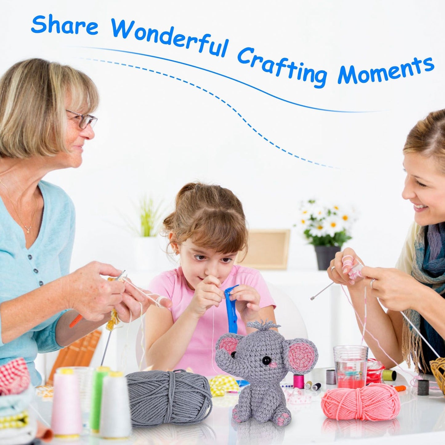 Group of three people, including a child, engaged in crafting together with colorful yarn and a crocheted elephant on the table, promoting creativity and shared crafting moments.